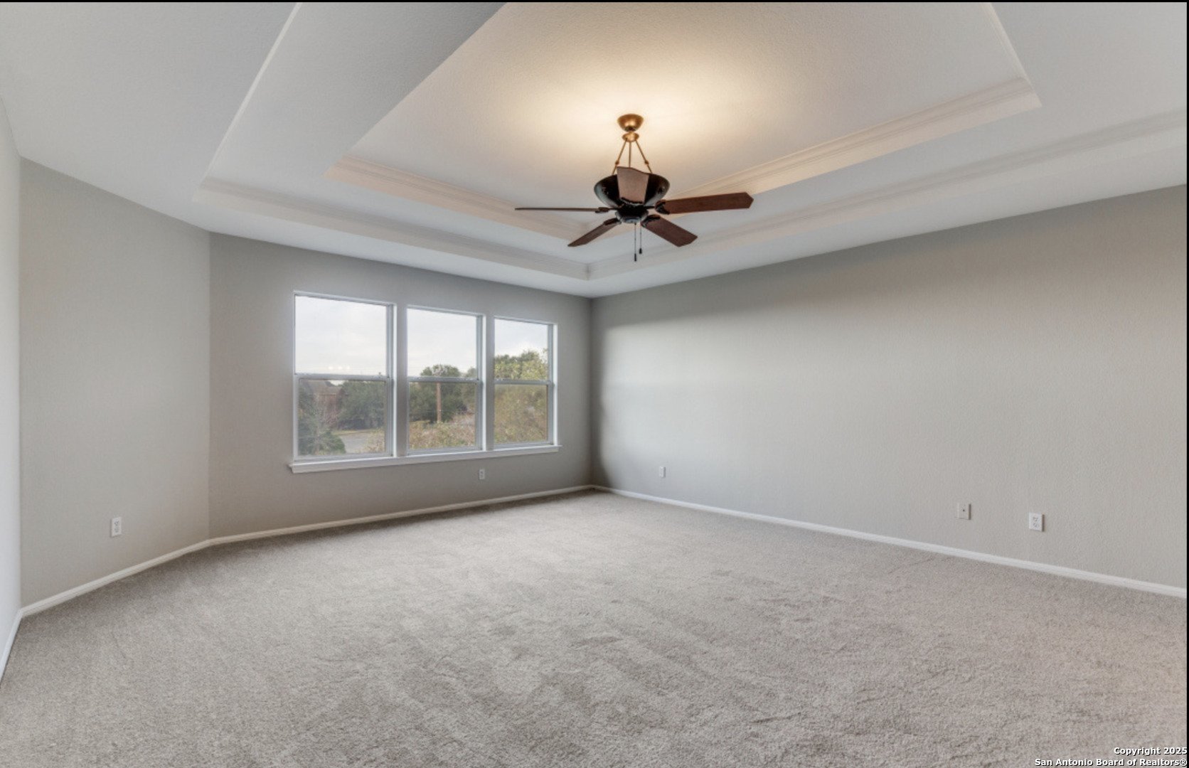 19431 Camino Ridge San Antonio, TX 78258 - Photo 6 of 25 a view of an empty room with a window
