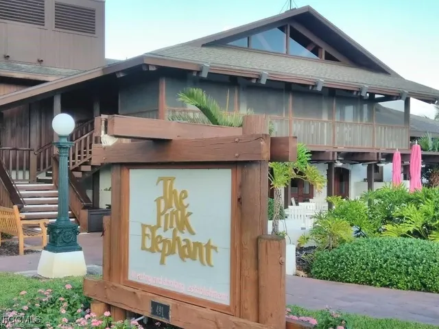 a view of a building with a garage