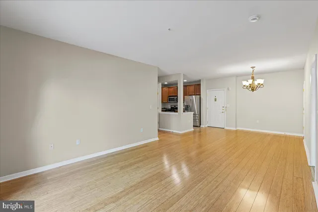 a utility room with sink dryer and washer