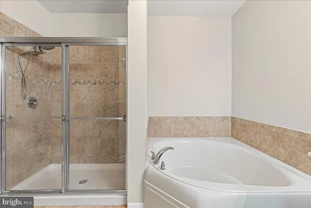 a view of empty room with windows