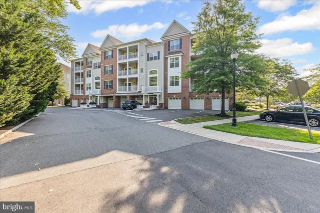 a view of a building with a yard