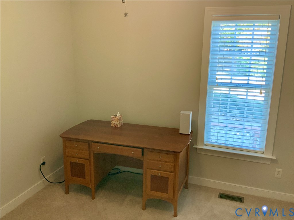 15801 Hampton Summit Lane Chesterfield, VA 23832 - Photo 14 of 42 a room with a table and a window