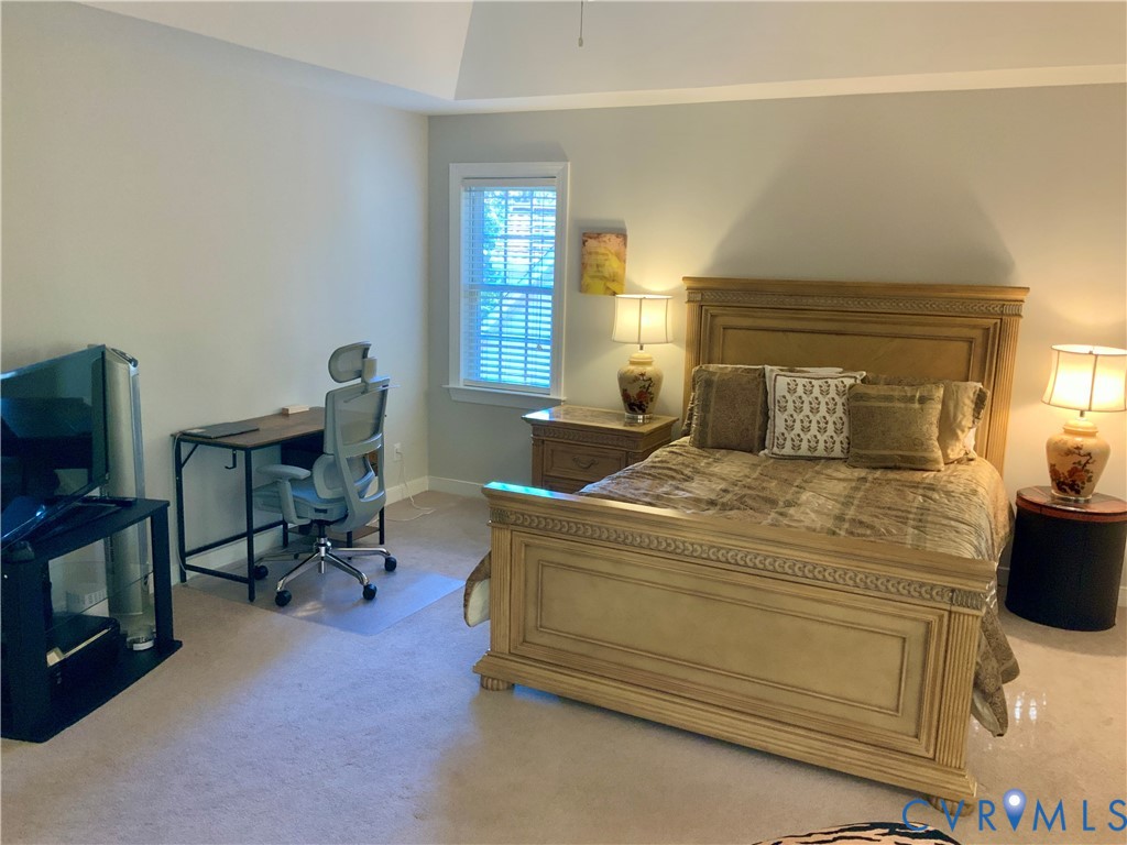 15801 Hampton Summit Lane Chesterfield, VA 23832 - Photo 19 of 42 a bedroom with a bed and a chair in it