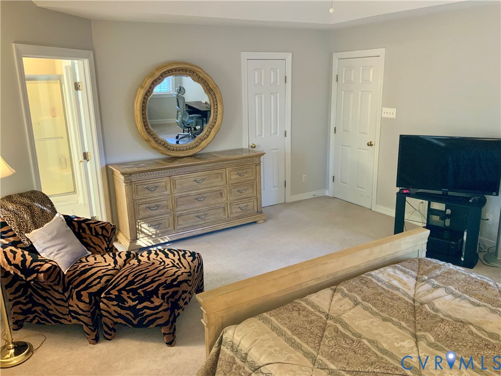 15801 Hampton Summit Lane Chesterfield, VA 23832 - Photo 20 of 42 a bedroom with a bed and a dresser