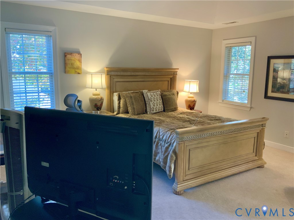 15801 Hampton Summit Lane Chesterfield, VA 23832 - Photo 22 of 42 a bedroom with a bed and a window