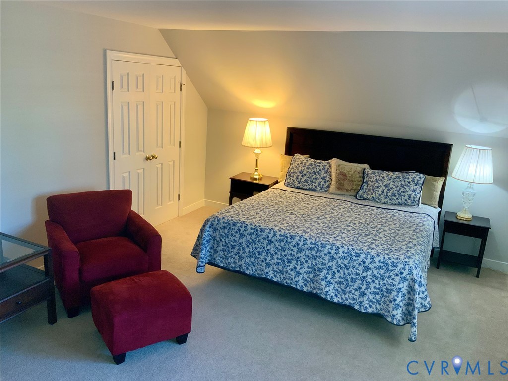 15801 Hampton Summit Lane Chesterfield, VA 23832 - Photo 27 of 42 a bedroom with bed and a couch