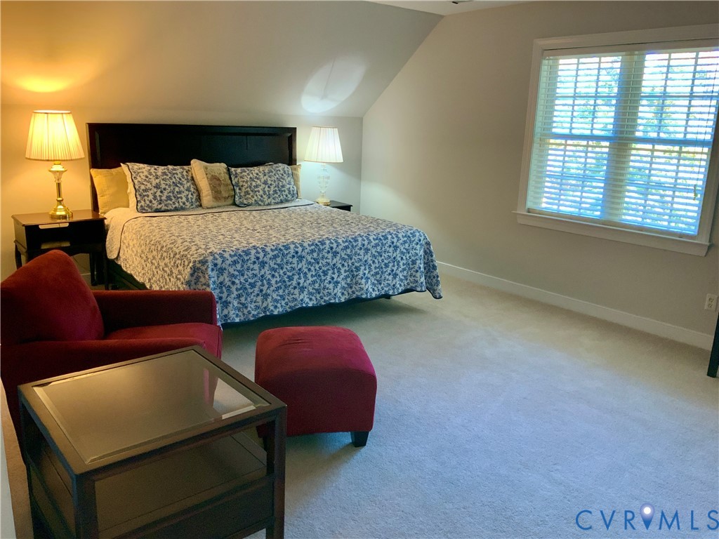 15801 Hampton Summit Lane Chesterfield, VA 23832 - Photo 28 of 42 a bedroom with a bed and a window
