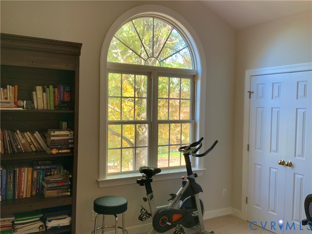 15801 Hampton Summit Lane Chesterfield, VA 23832 - Photo 32 of 42 a view of a livingroom with furniture and a window