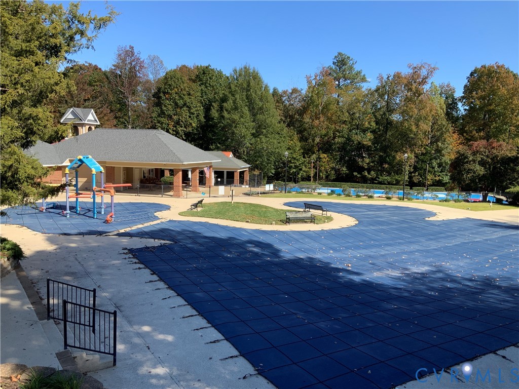 15801 Hampton Summit Lane Chesterfield, VA 23832 - Photo 39 of 42 a view of a swimming pool with an outdoor space and seating area