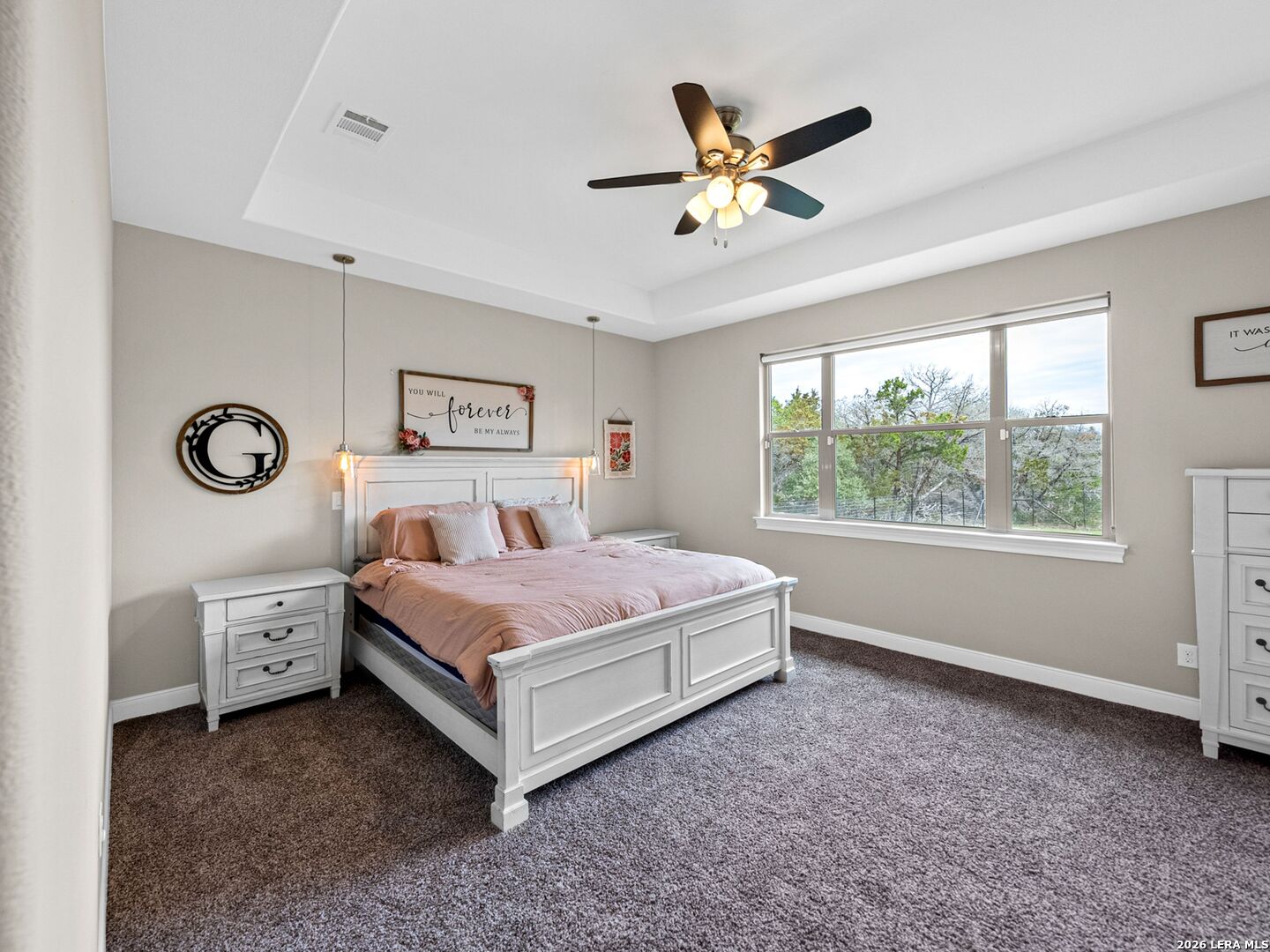 1025 Deep Water Drive Spring Branch, TX 78070 - Photo 13 of 55 a bed room with a bed and window