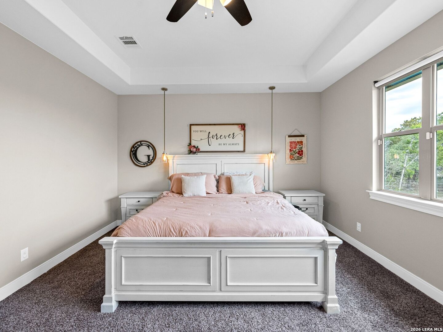 1025 Deep Water Drive Spring Branch, TX 78070 - Photo 14 of 55 a bedroom with a bed and a window