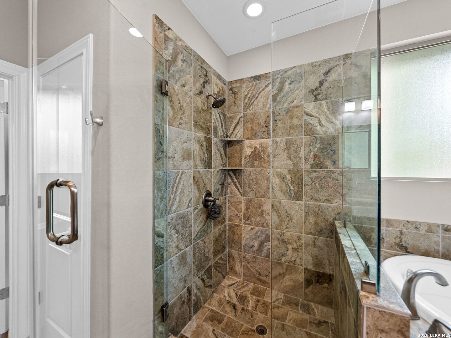 1025 Deep Water Drive Spring Branch, TX 78070 - Photo 18 of 55 a bathroom with a shower