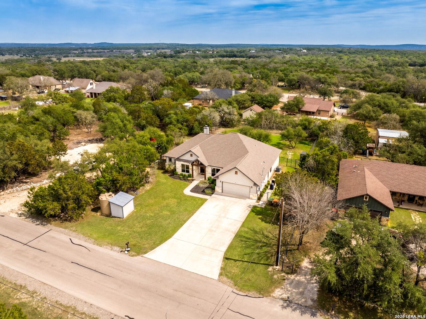 1025 Deep Water Drive Spring Branch, TX 78070 - Photo 2 of 55 an aerial view of residential houses with outdoor space