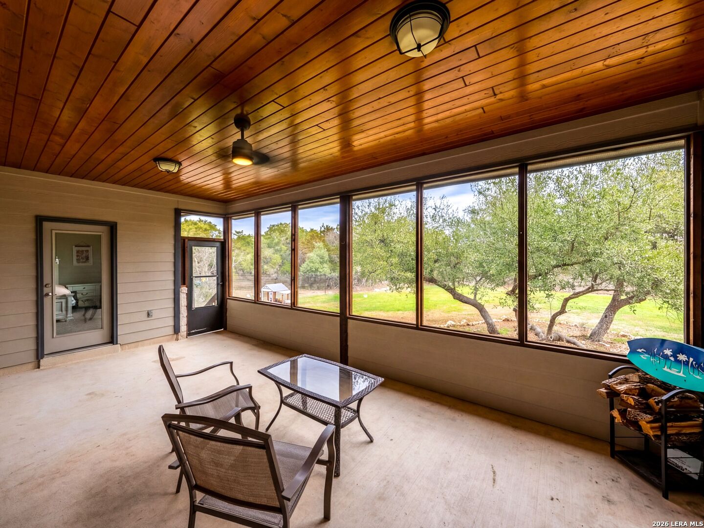 1025 Deep Water Drive Spring Branch, TX 78070 - Photo 36 of 55 a living room with furniture and windows