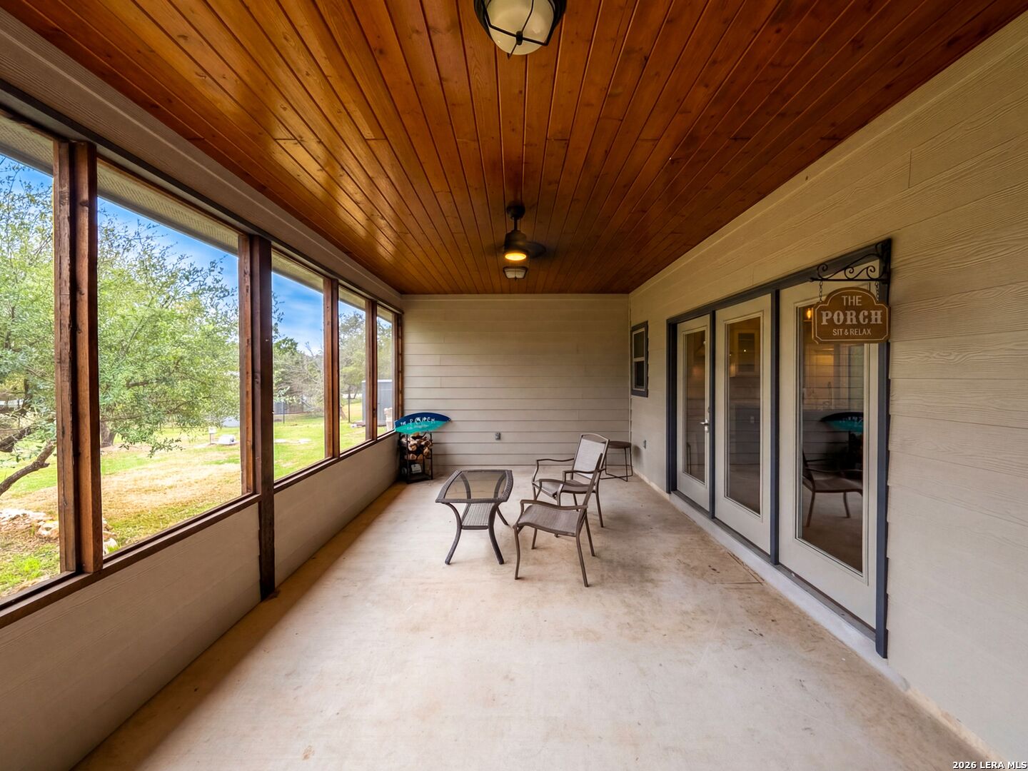 1025 Deep Water Drive Spring Branch, TX 78070 - Photo 37 of 55 a dining room with furniture a chandelier and a large window