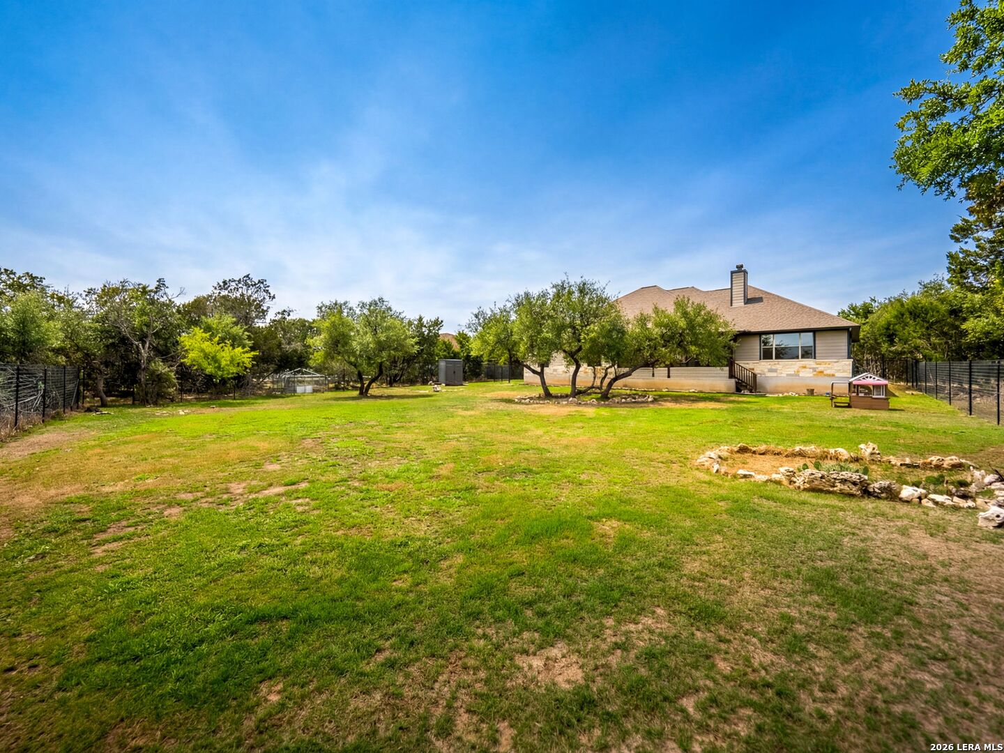 1025 Deep Water Drive Spring Branch, TX 78070 - Photo 40 of 55 a view of yard with swimming pool and green space