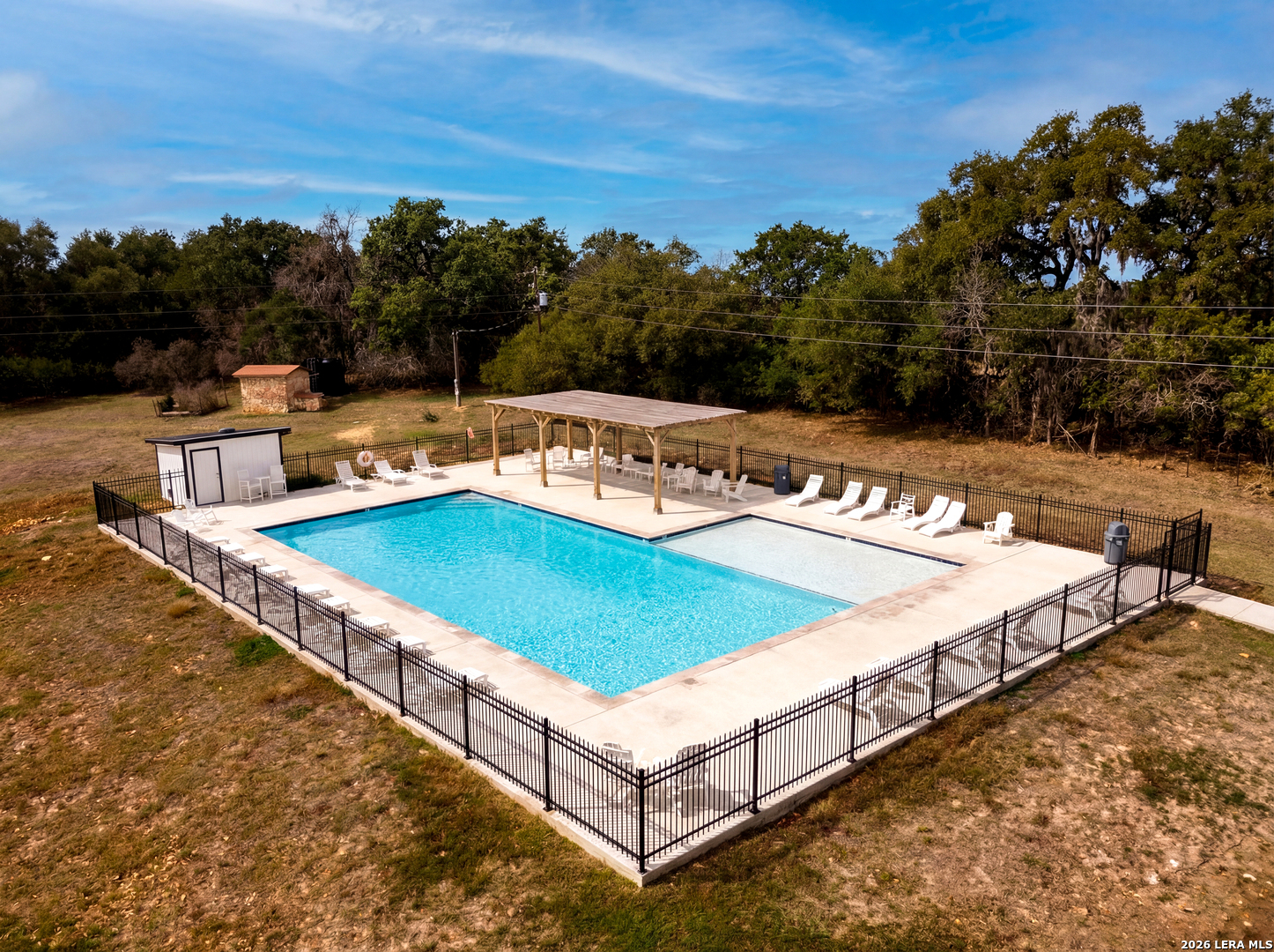 1025 Deep Water Drive Spring Branch, TX 78070 - Photo 49 of 55 a view of a backyard with a patio and ocean view
