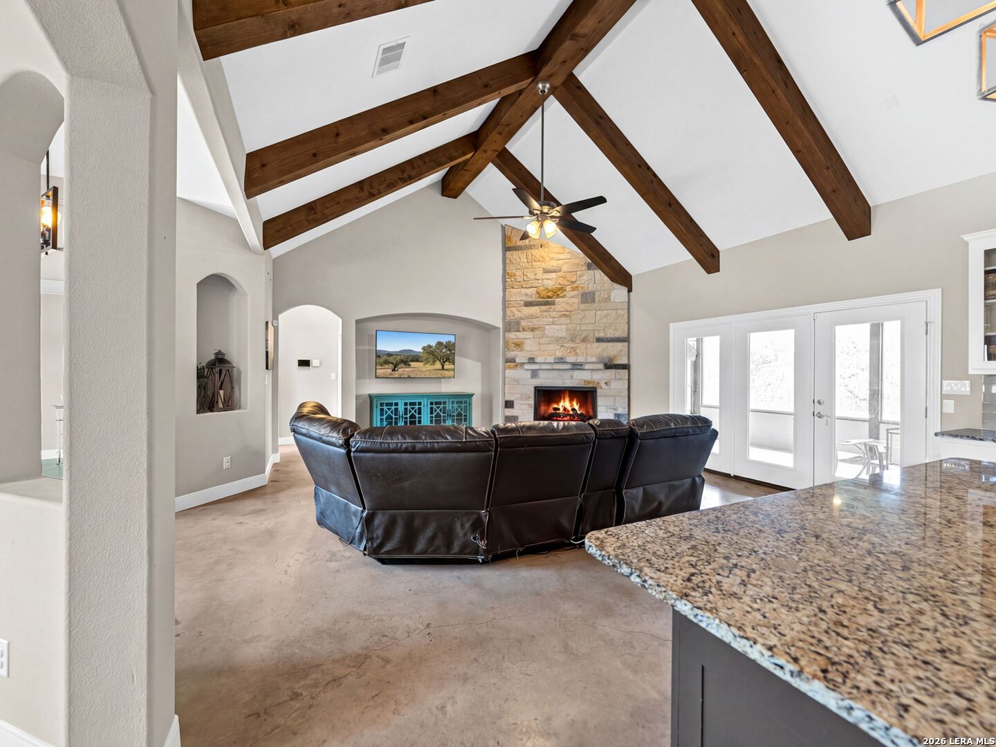 1025 Deep Water Drive Spring Branch, TX 78070 - Photo 9 of 55 a living room with furniture and a large window
