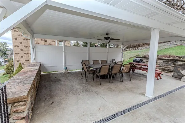 a dining room with furniture and a table