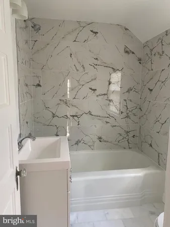 a bathroom with a bathtub