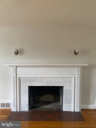 a living room with a fireplace