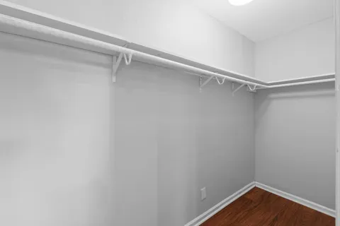 a view of an empty walk in closet