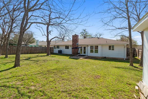 a front view of a house with swimming pool