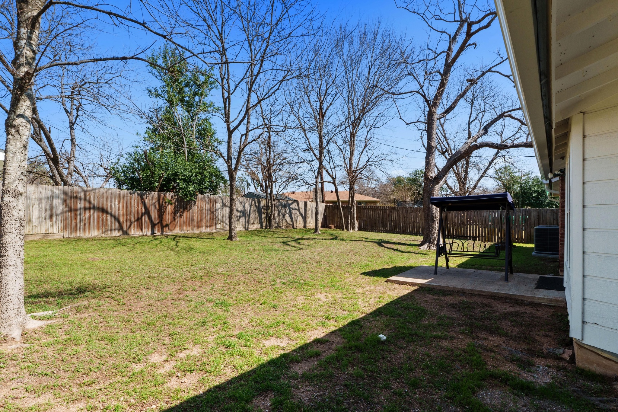 2312 Rogge Lane Austin, TX 78723 - Photo 30 of 34 Fenced backyard with a patio.