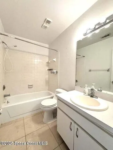 a bathroom with a sink a toilet and a bathtub