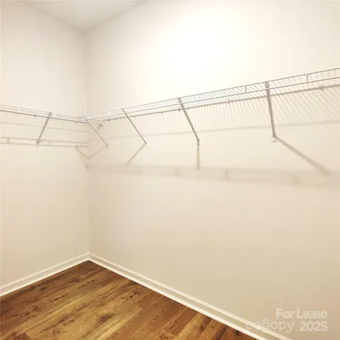 a view of a room with racks on the wall