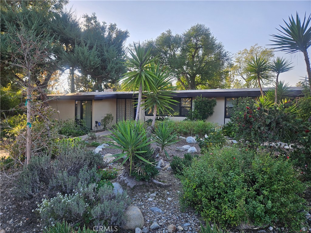 a view of a house with a street