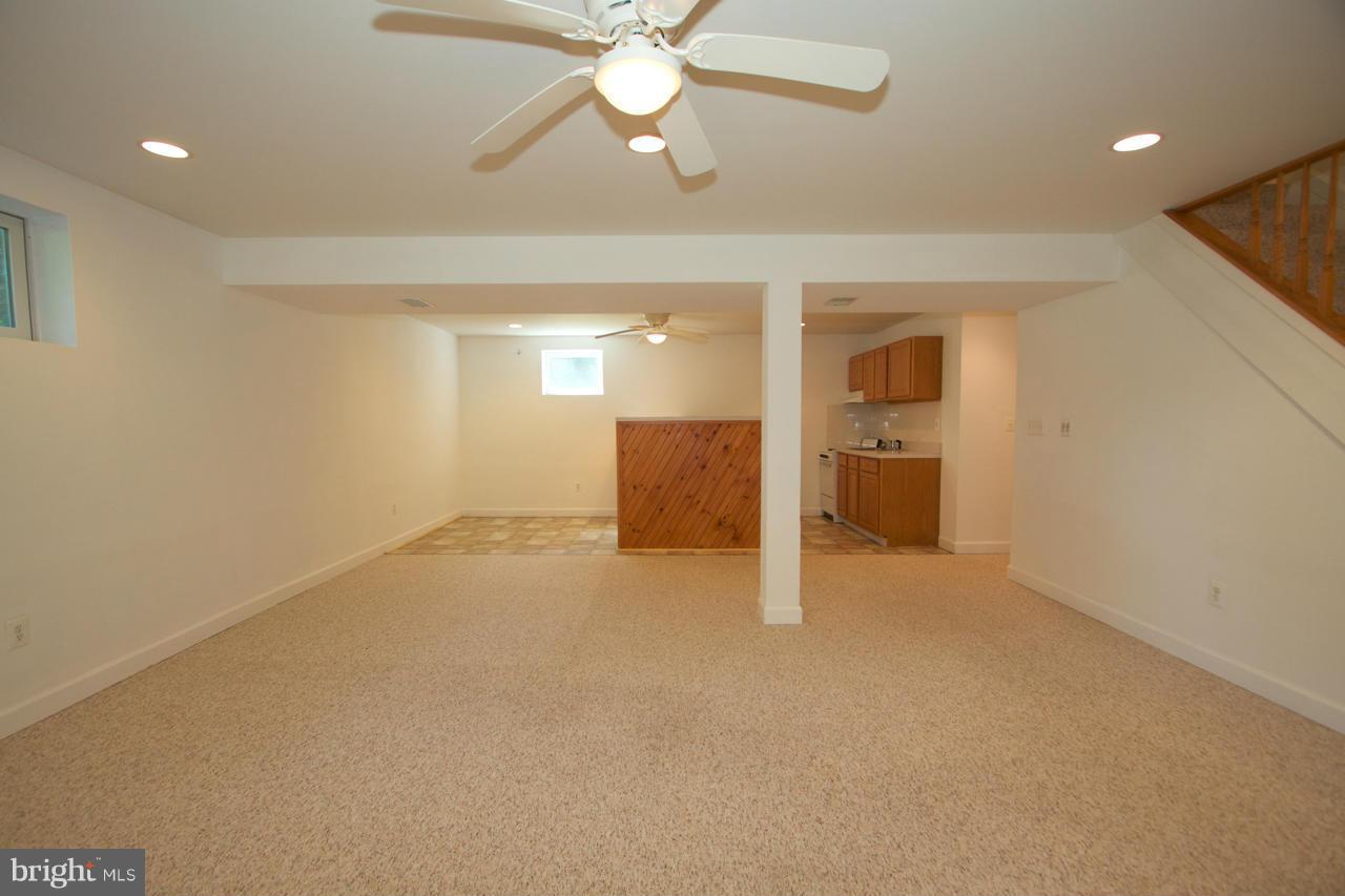 490 Copeland Road Fallston, MD 21047 - Photo 22 of 29 an empty room with a empty space and a ceiling fan