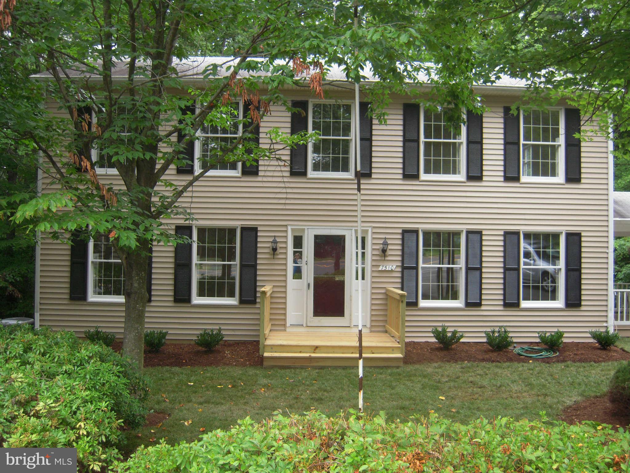 7510 Gambrill Road Springfield, VA 22153 - Photo 2 of 30 front view of a house with a yard