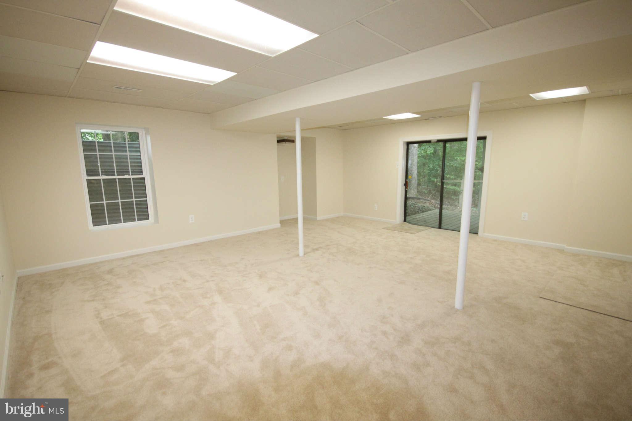 7510 Gambrill Road Springfield, VA 22153 - Photo 14 of 30 an empty room with windows and closet