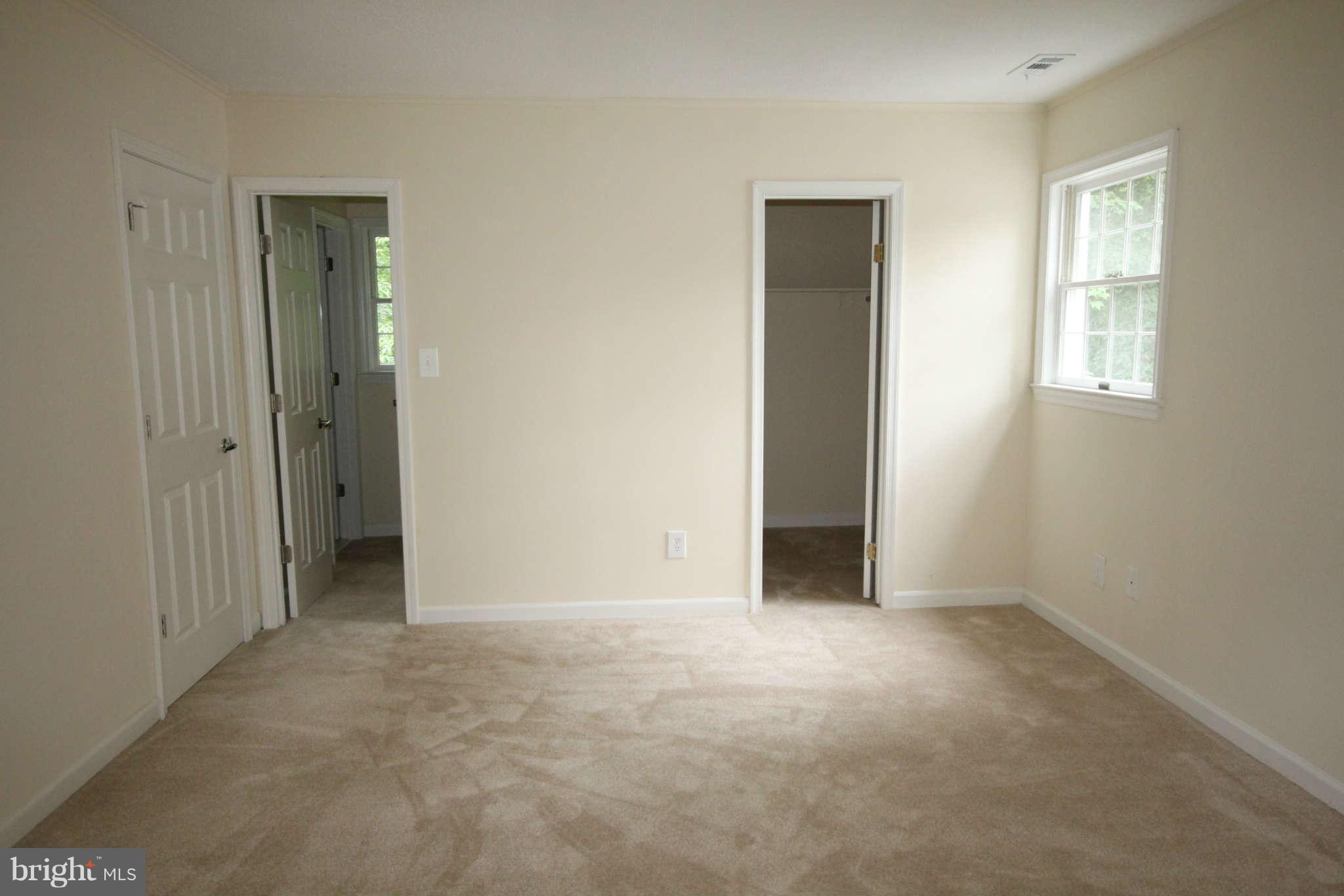 7510 Gambrill Road Springfield, VA 22153 - Photo 15 of 30 an empty room with windows and closet