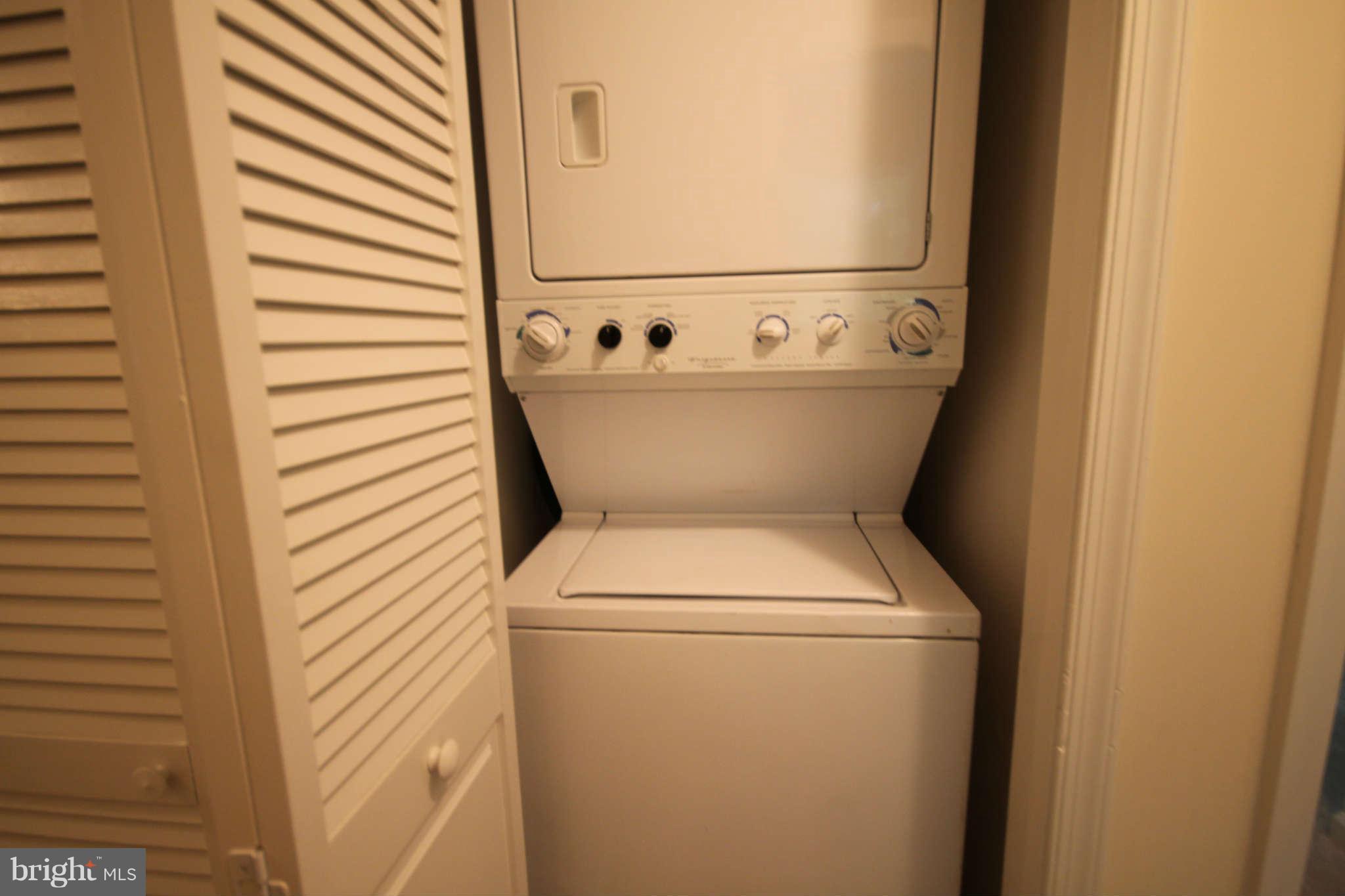 7510 Gambrill Road Springfield, VA 22153 - Photo 21 of 30 a utility room with dryer and washer