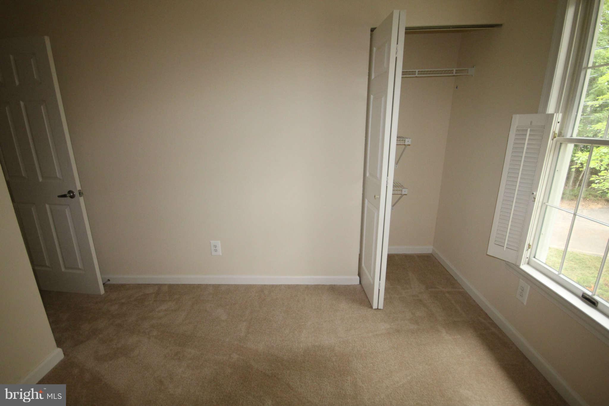 7510 Gambrill Road Springfield, VA 22153 - Photo 22 of 30 an empty room with windows