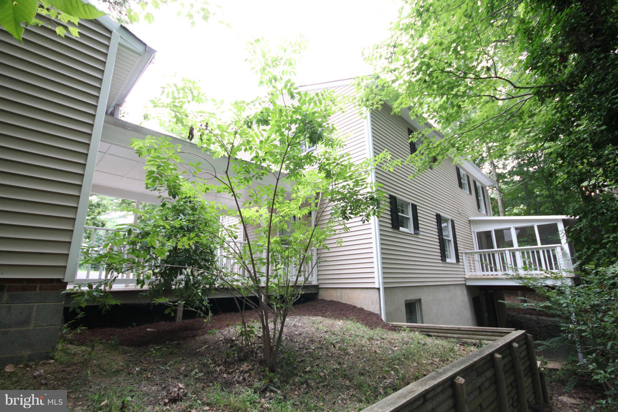 7510 Gambrill Road Springfield, VA 22153 - Photo 7 of 30 a front view of a house with garden