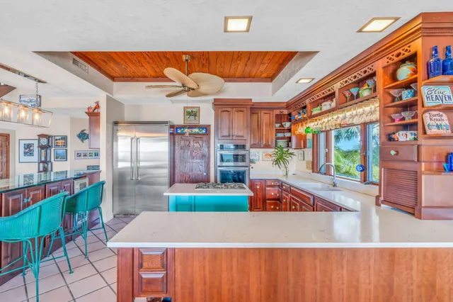 swimming pool view with a seating space