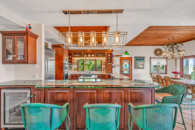 a view of a balcony with furniture