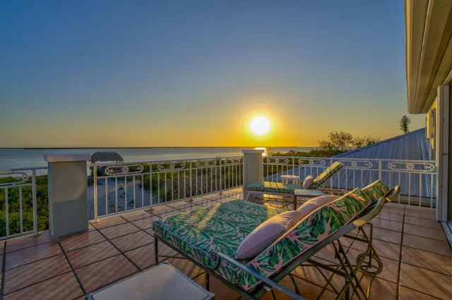 a bathroom with a sink toilet mirror and shower