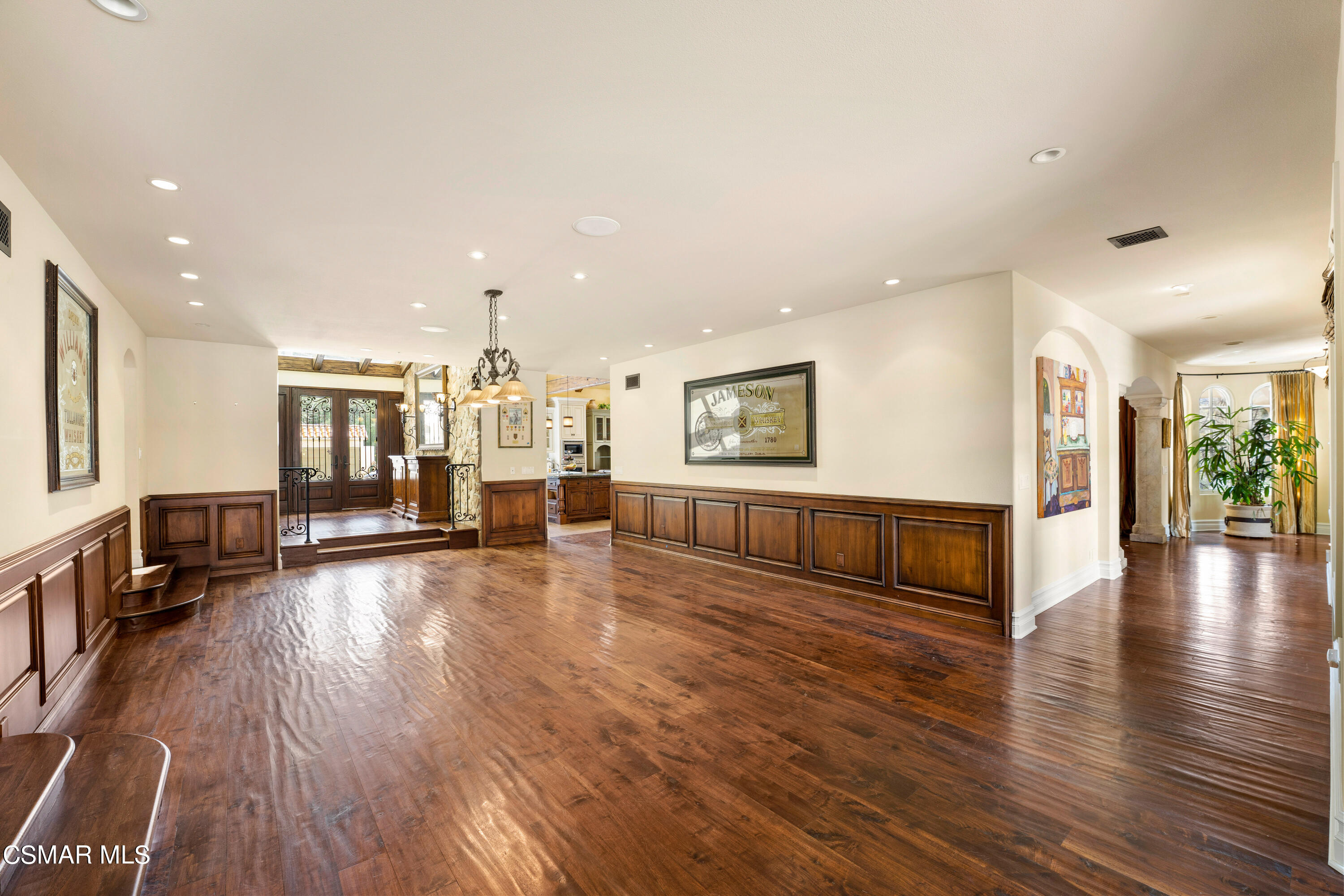 28685 Wagon Road Agoura Hills, CA 91301 - Photo 16 of 43 a living room with furniture and a wooden floor