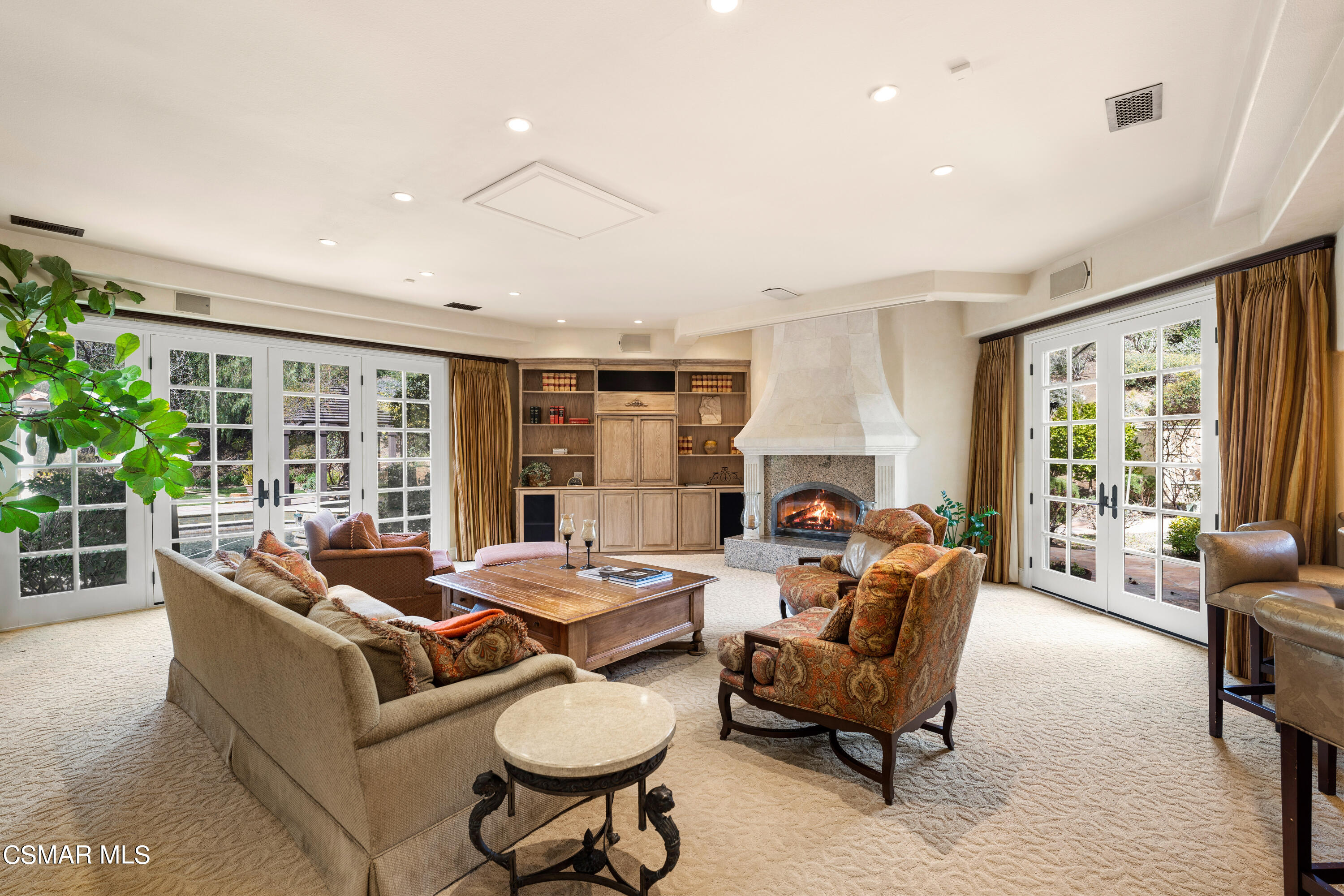 28685 Wagon Road Agoura Hills, CA 91301 - Photo 18 of 43 a living room with furniture and a large window
