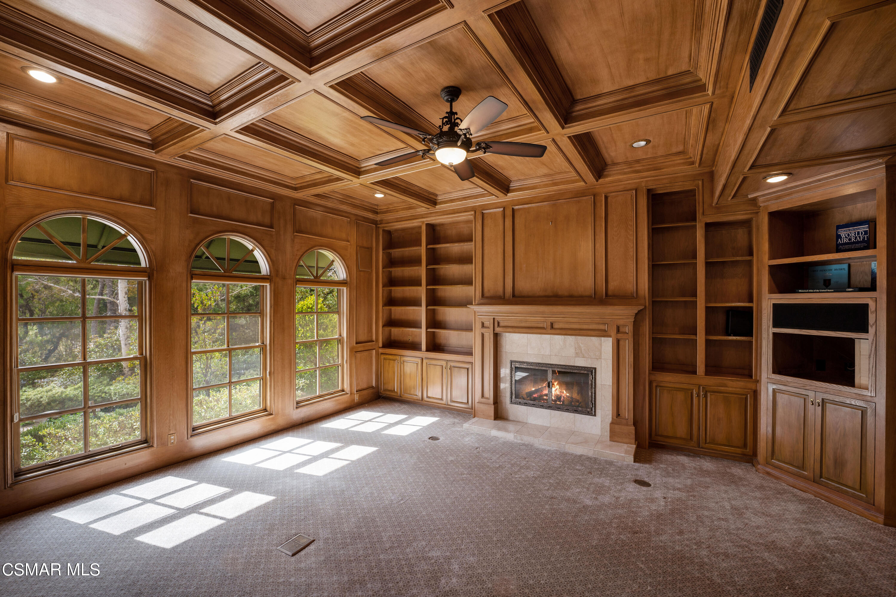 28685 Wagon Road Agoura Hills, CA 91301 - Photo 20 of 43 a view of an empty room with a fireplace and a window