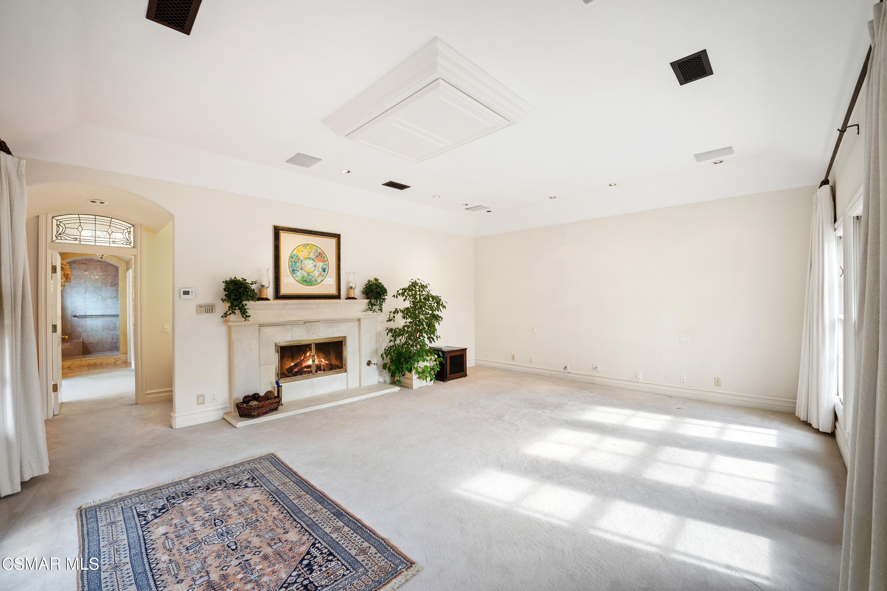 28685 Wagon Road Agoura Hills, CA 91301 - Photo 22 of 43 a view of a livingroom with a fireplace