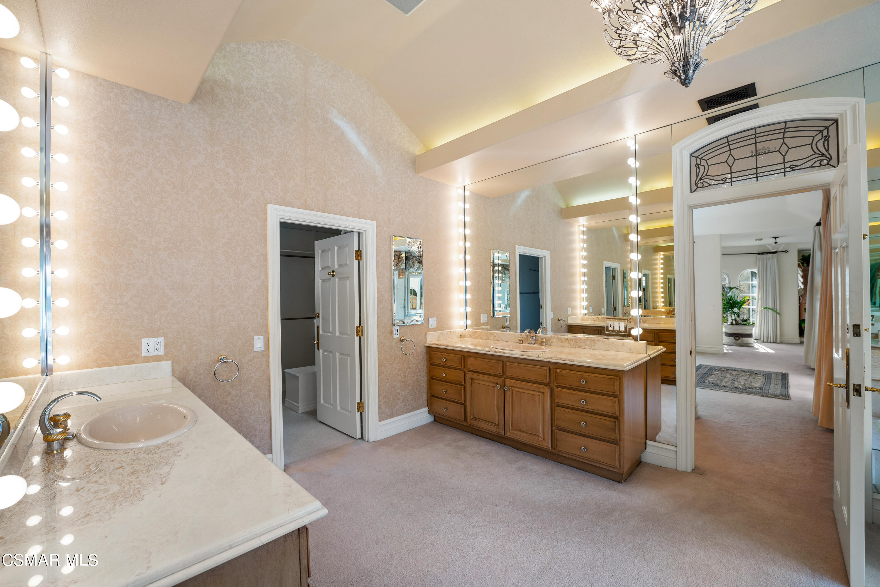 28685 Wagon Road Agoura Hills, CA 91301 - Photo 25 of 43 a large bathroom with a tub sink and mirror