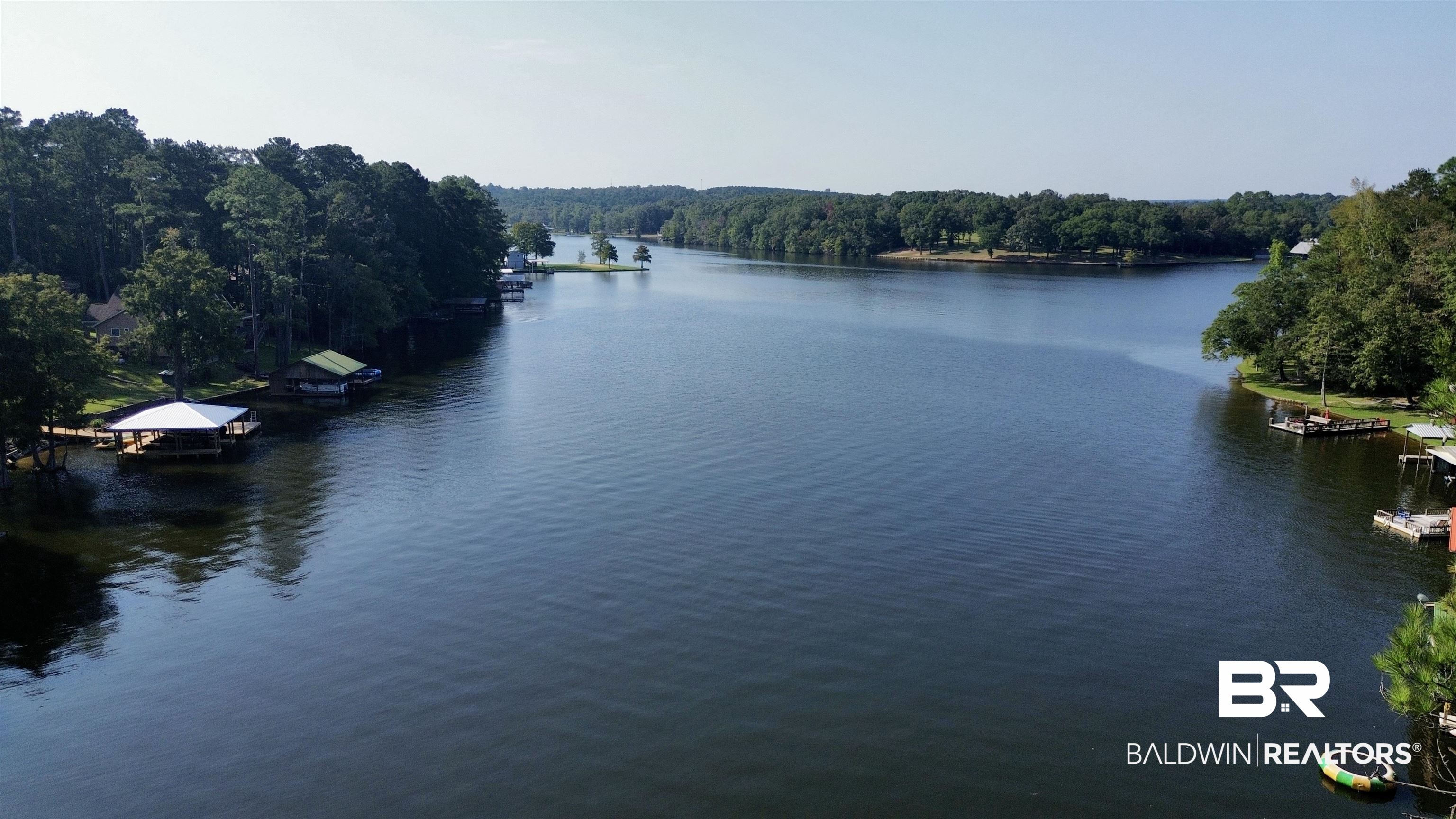 0 Twin Oaks Road Andalusia, AL 36421 - Photo 2 of 7 Water view featuring a heavily wooded area and a dock