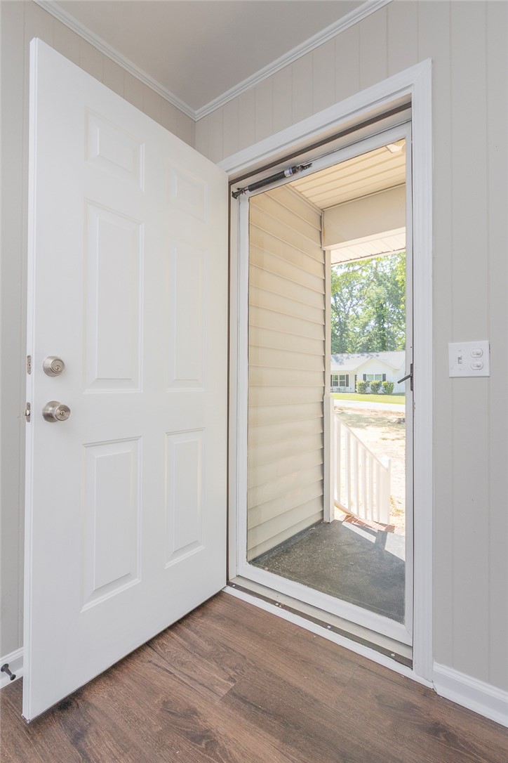 113 Linda Lane Honea Path, SC 29654 - Photo 5 of 36 Welcome home to a bright and inviting entrance featuring durable flooring and a clear view outside.