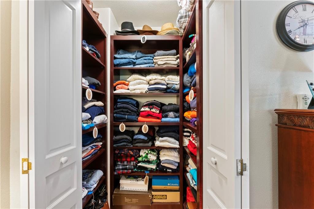 320 Holly Lane Walhalla, SC 29691 - Photo 19 of 41 This organized walk-in closet features ample shelving for convenient storage solutions.