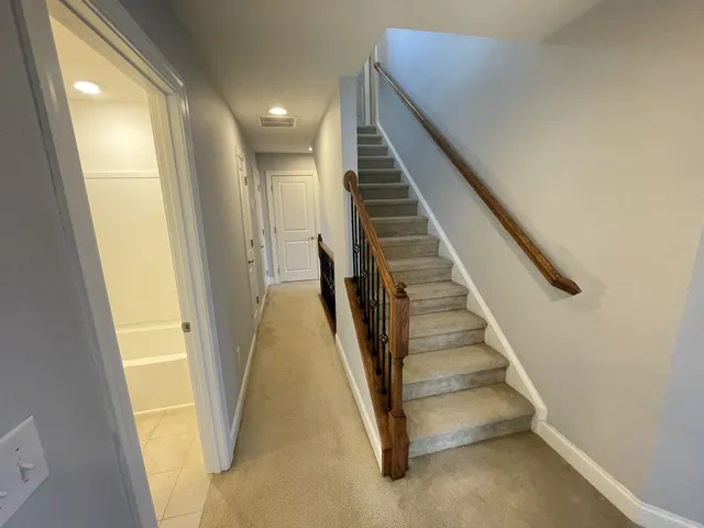 a bathroom with a tub and a shower